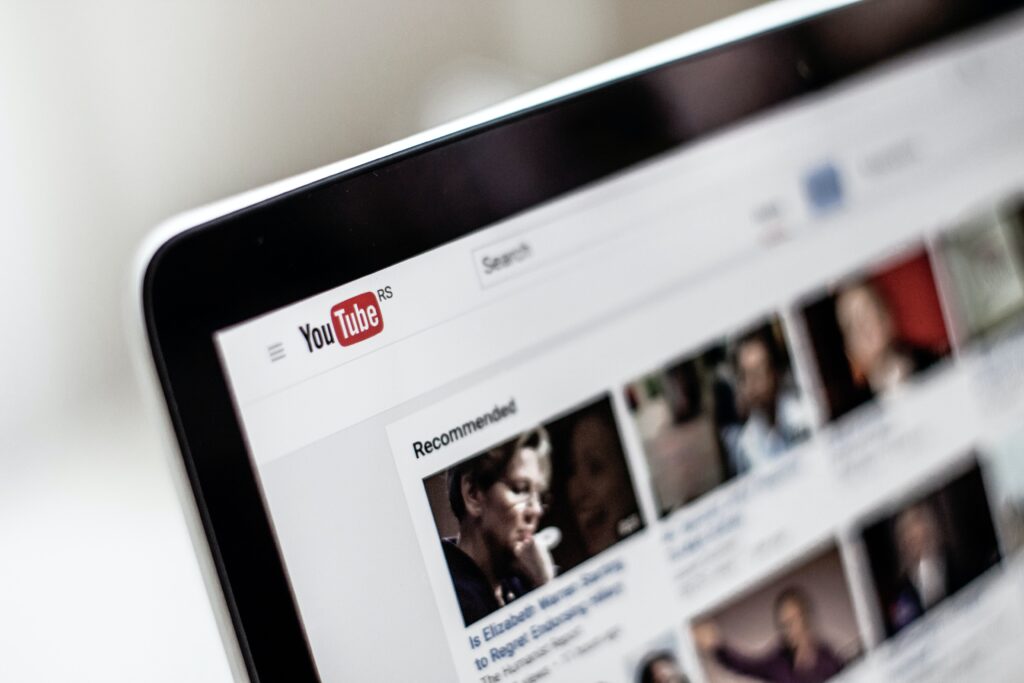 Laptop showing YouTube homepage