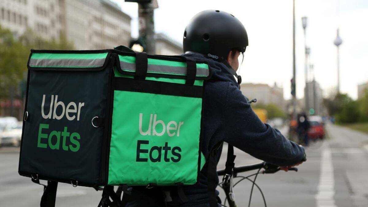 Uber Eats employee making a delivery